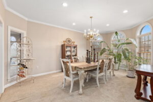 Formal dining room with elegant furnishings at 1069 Windsor Drive, Gallatin, TN.